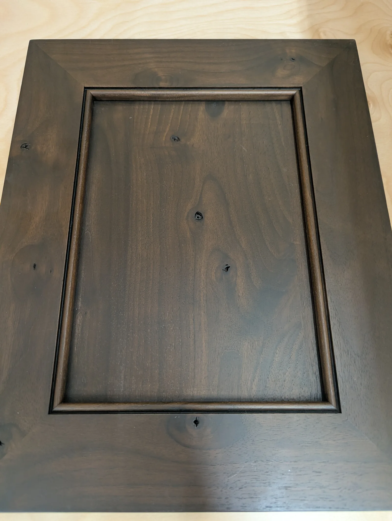 A 10-degree clear coat over stained walnut, grain fully visible