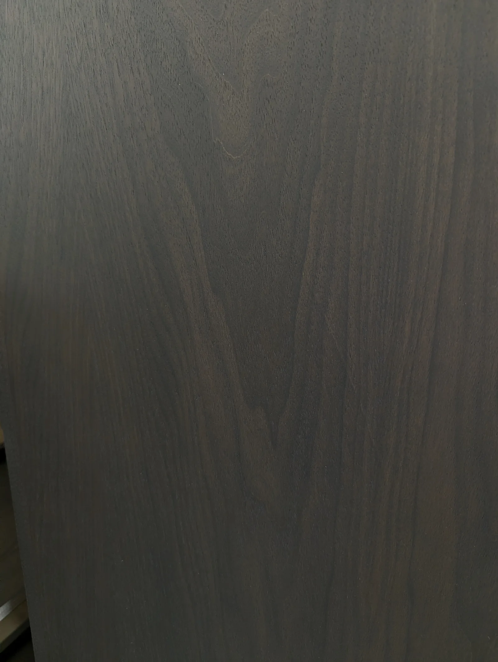 A 5-degree clear coat over stained walnut, flat and modern